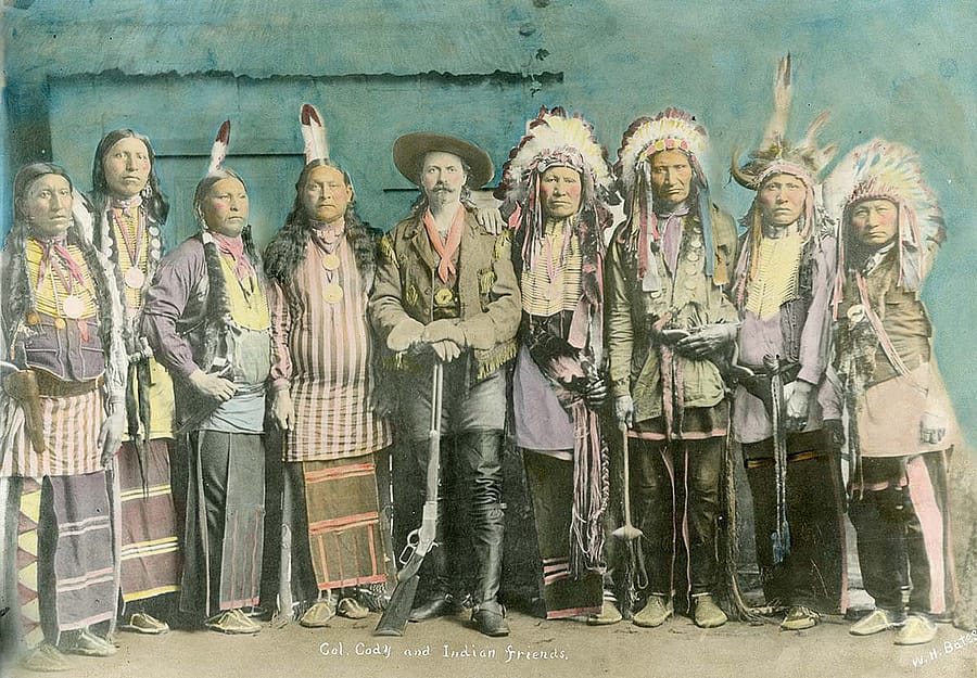 A large number of images of Native Americans in Buffalo Bill's Wild West are posed photographs, some even in studios. Tom F. Cunningham describes how a special image he saw was anything but staged. (Hand-tinted photograph of William F. "Buffalo Bill" Cody with his "Indian Friends," ca. 1886. MS 6 William F. Cody Collection, McCracken Research Library. P.69.813)