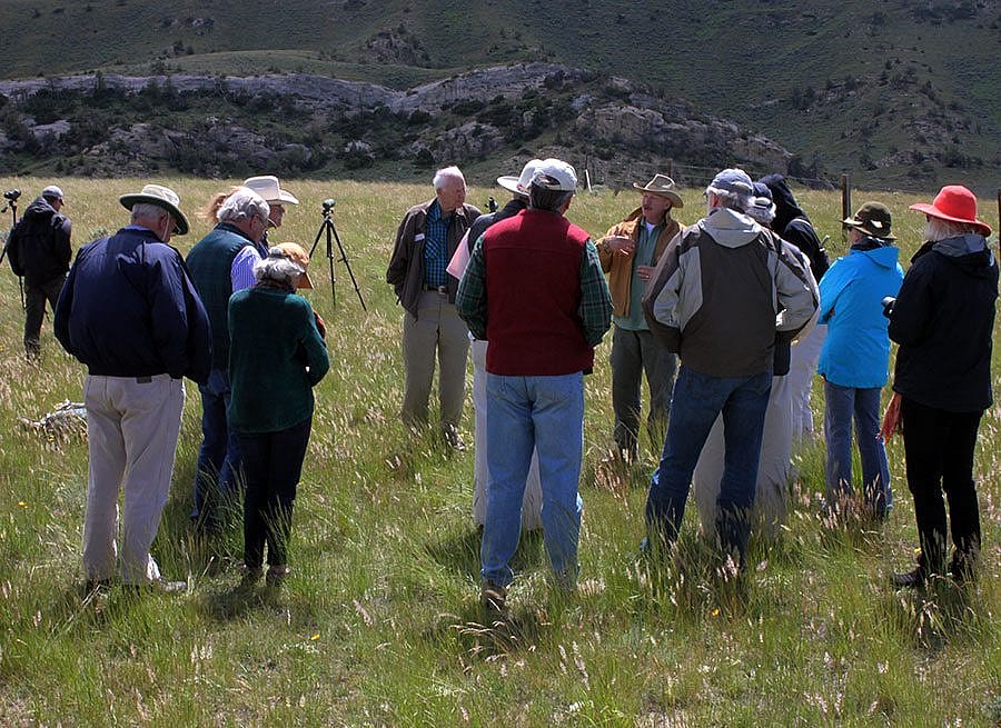 In June 2014, Draper Museum Advisory Board members visited a golden eagle nest site (on cliff in background) to learn about the latest research developments.