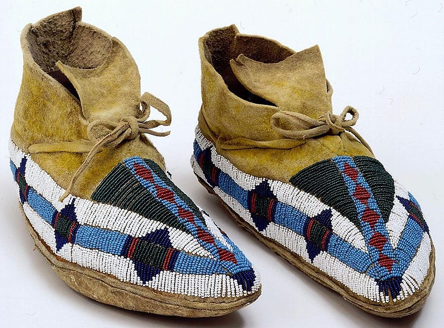 Moccasins, ca. 1885. Ute. Rawhide, deerskin, seed beads, pigments. Gift of The Coe Foundation. 1.67.21