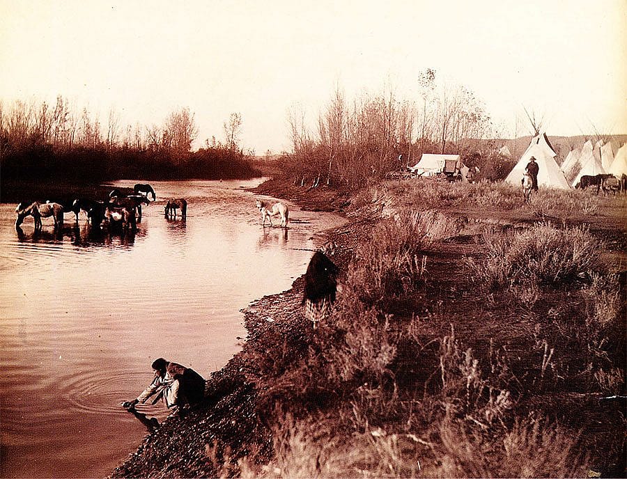 "Crow camp." Fred E. Miller was a trained photographer living on the Crow Indian Reservation at the turn of the nineteenth century. This image is from one of his original prints. MS 211 Suzanne Thompson Adams Collection.