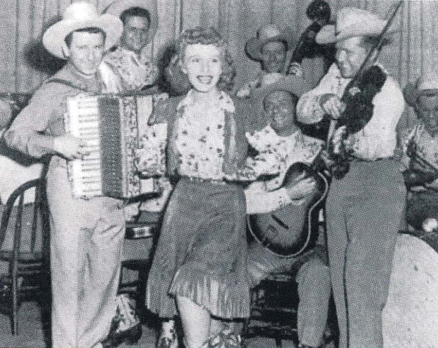 Pee Wee King & His Golden West, featured on WLS National Barn Dance, with Carolyn Cotton who appeared on Hollywood Barn Dance. Cowboy Songs Archive. Gift of Janet McBride.