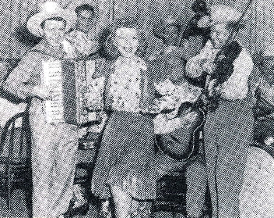 Pee Wee King & His Golden West, featured on WLS National Barn Dance, with Carolyn Cotton who appeared on Hollywood Barn Dance. Cowboy Songs Archive. Gift of Janet McBride.