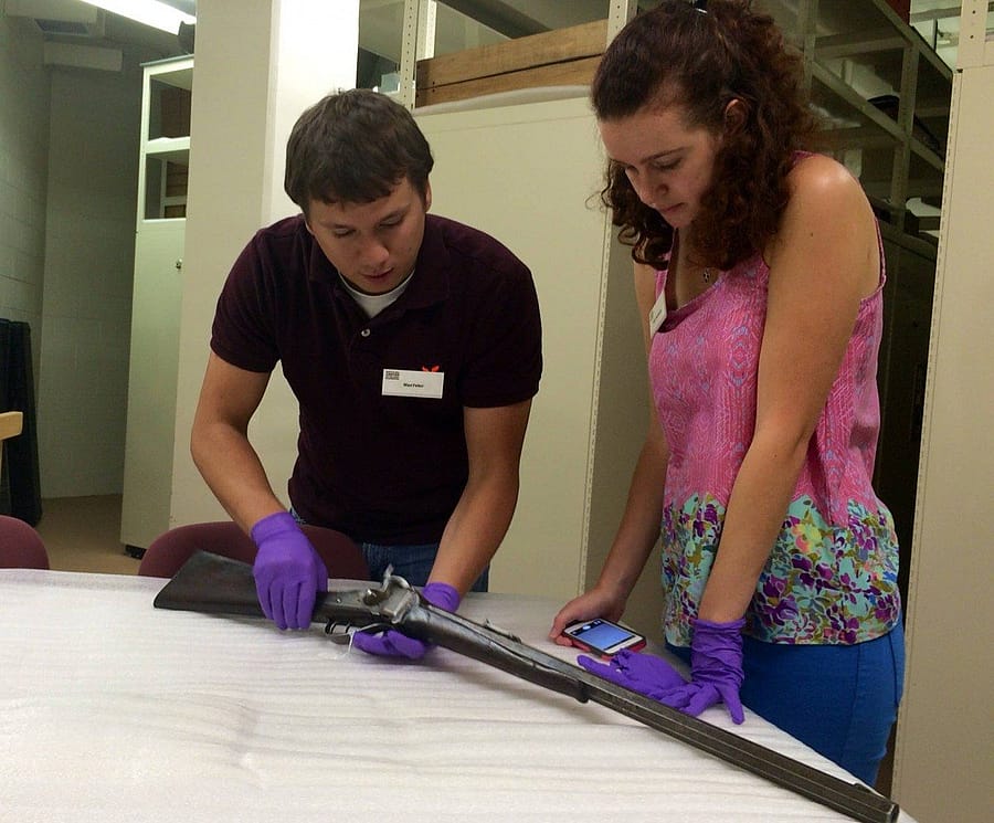 Ruby Harrington (author and CFM intern) and Max Yeley (another Center intern) working in the vault.