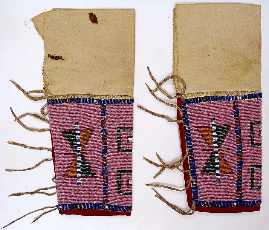 Women's leggings. Assiniboine. Chandler-Pohrt Collection, Gift of Mr. and Mrs. Richard A. Pohrt. NA.202.427