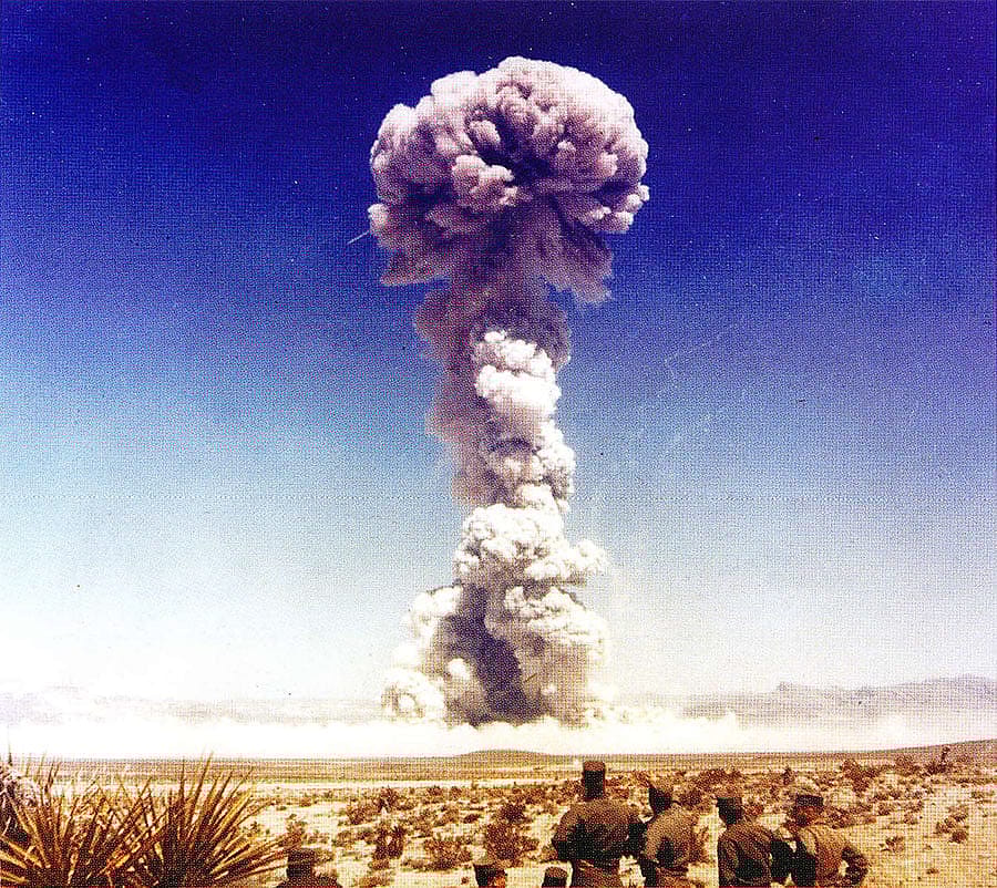 In the 1950s, mushroom clouds were often seen in the skies near Las Vegas, Nevada. Pictured here are military personnel observing one of the tests in the skies near Las Vegas, Nevada. Pictured here are military personnel observing one of the tests in the Buster-Jangle Series in the fall of 1951 at the Nevada Test Site (NTS). Between 1951 and 1992, more than 150 nuclear bombs were detonated at NTS. Photo courtesy of National Nuclear Security Administration / Nevada Site Office.