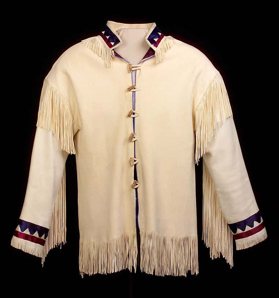 This jacket featuring colorful ribbon work and soft tanned deerskin is an example of the simple elegance characteristic of southern Plains. Jacket. Vanessa Paukeigope Jennings, Kiowa and Apache, Fort Cobb, Oklahoma, early 1980s. Tanned deerskin, ribbons, glass beads, horn. Temporary loan from B. Byron Price.