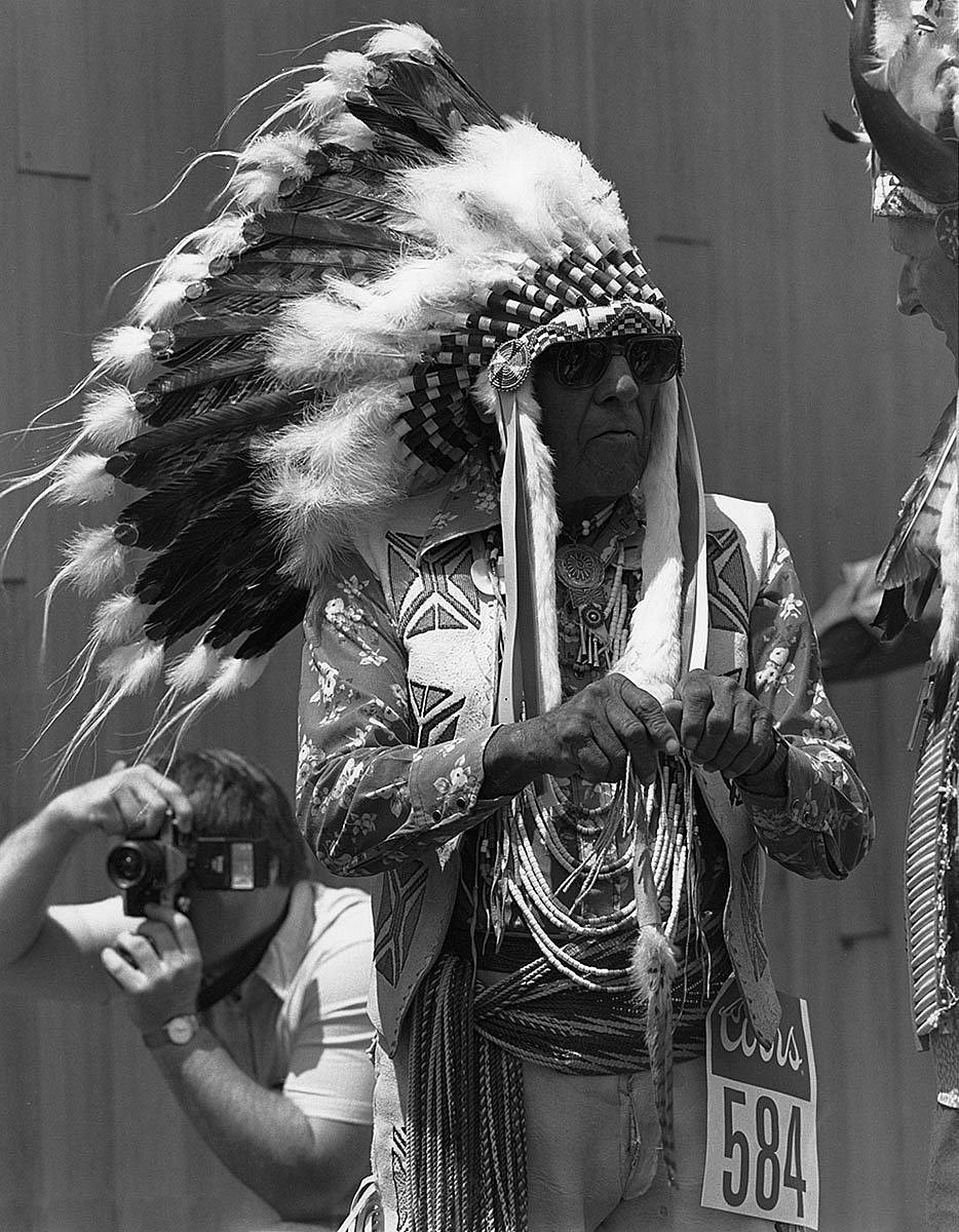 Joe Medicine Crow, Crow tribal elder, at the Plains Indian Museum Powwow, June 1987. MS 243 James Bama Collection. P.243.2