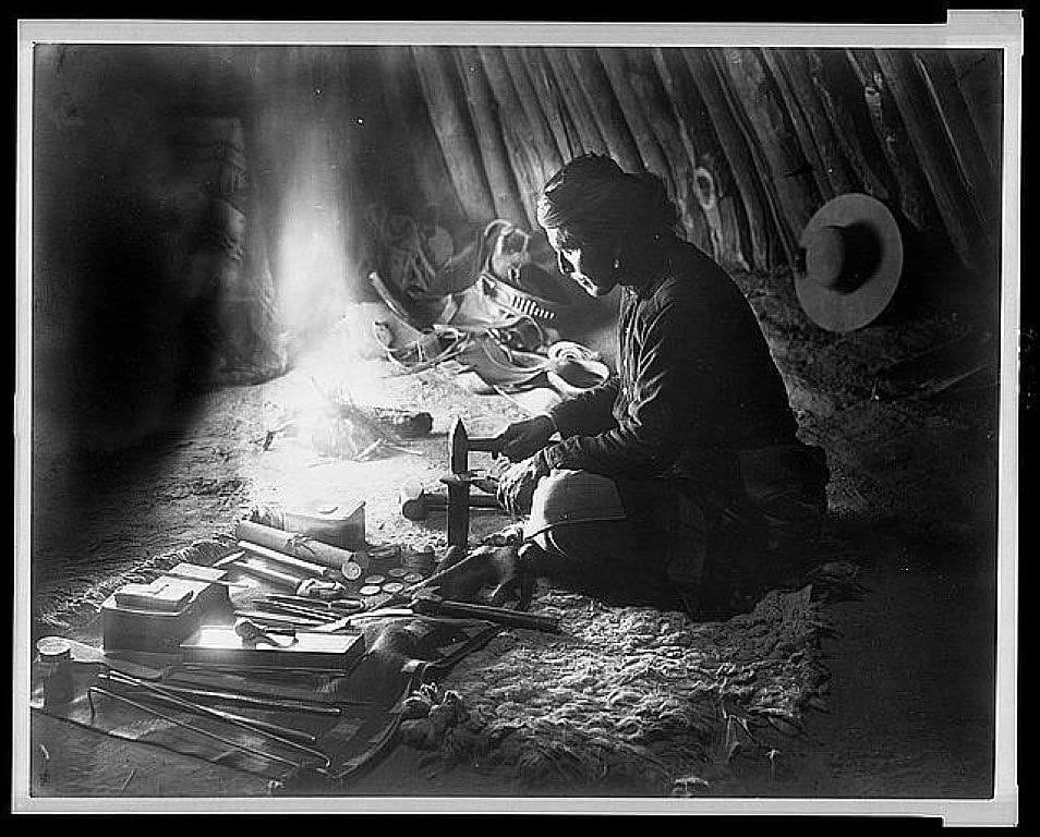 Navajo Silversmith, image courtesy Library of Congress.