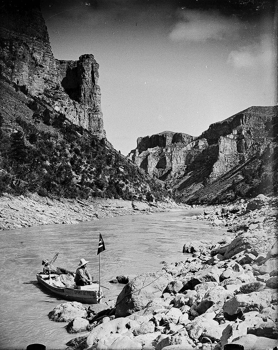 A Treasure from Our West: Glass plate negative by Charles J. Belden (1887-1966). Alton Wickwire and Carl Dunrud with the boat "Spirit of the Pitchfork" on the Big Horn River before it was dammed, August 1928. Charles Belden Collection. PN.67.432b