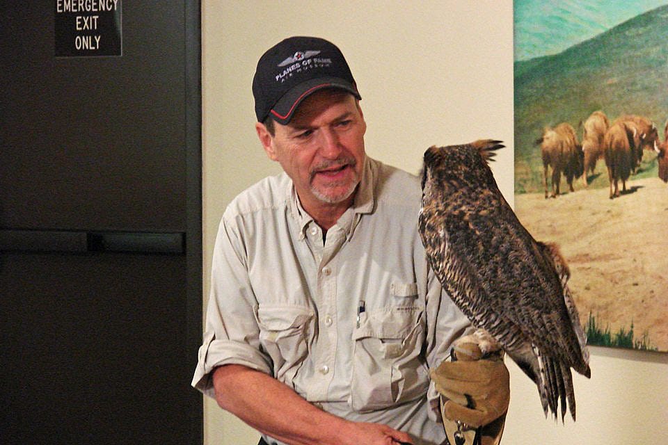 Bill having a little private conversation with Teas the Owl at the Draper Natural History Museum.