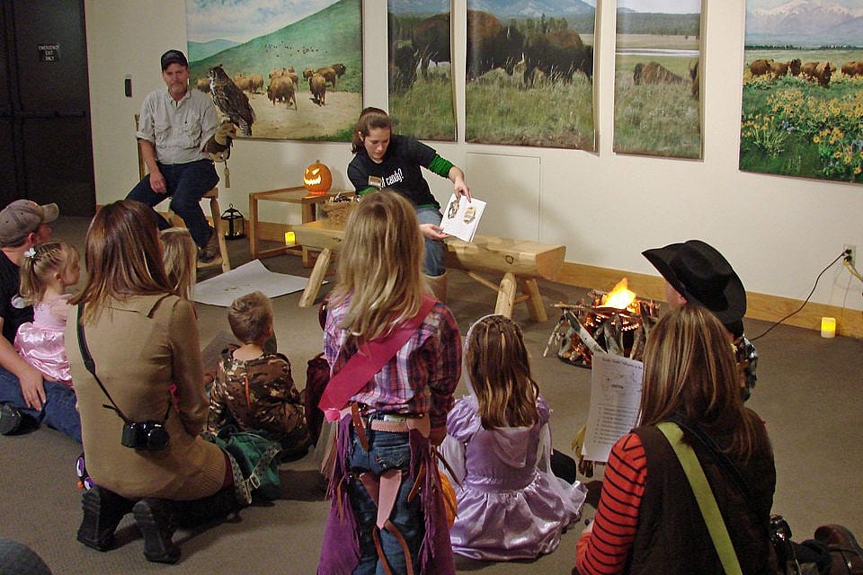 In this photo, Jordan reads an owl story to the last group of children, as Teasdale, on Bill's glove, totally ignored everyone.