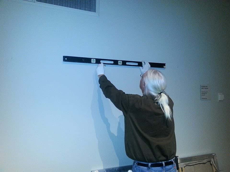 Leveling the hangers.