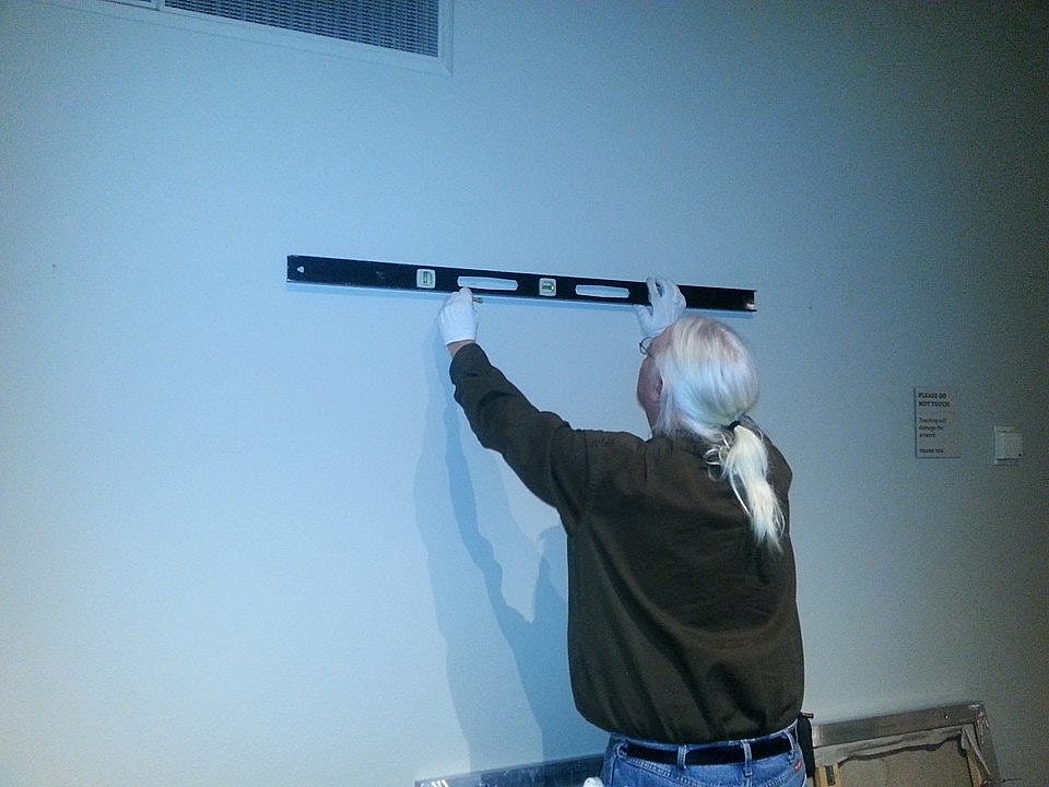 Leveling the hangers.