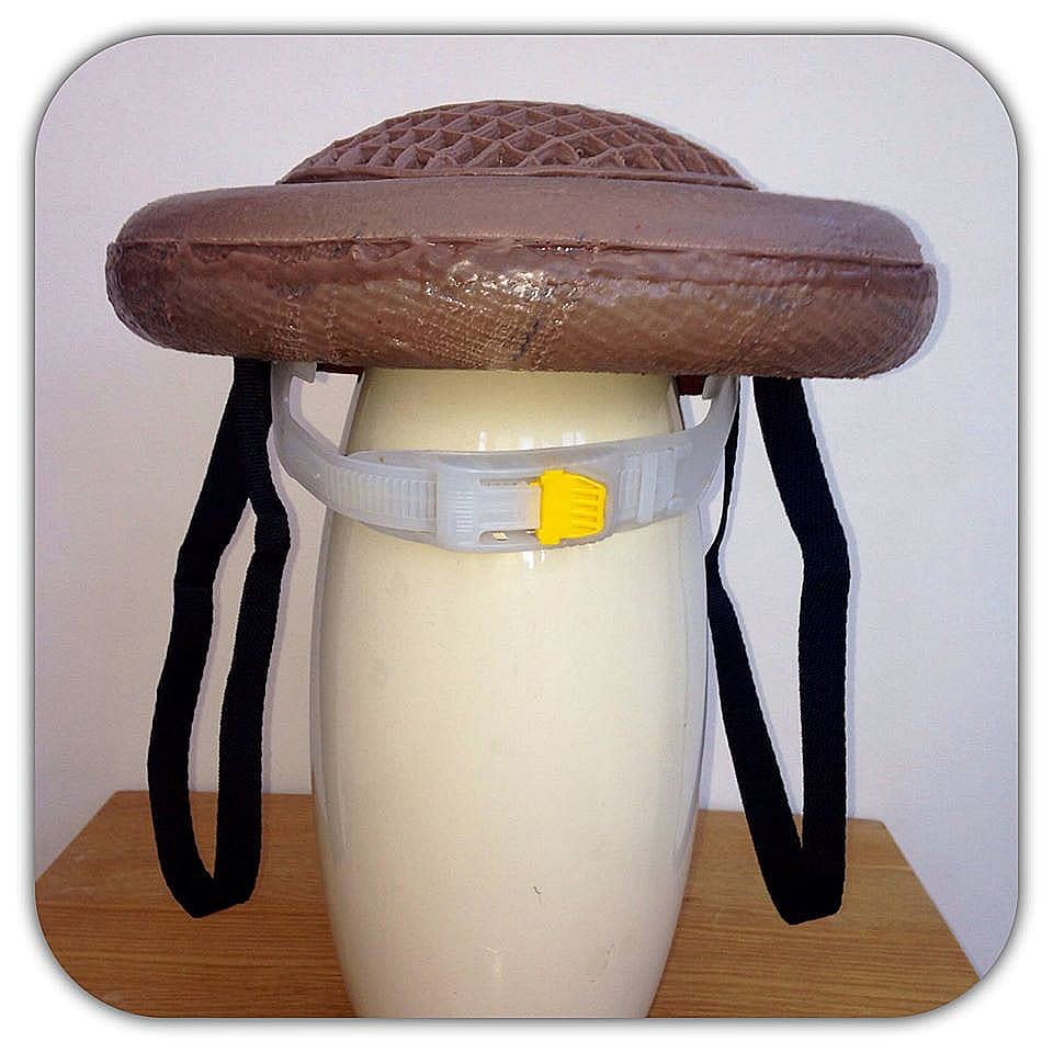 A display of a brown copulation hat to show as an example.