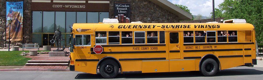 Students on a MILES funded trip wave in front of the Center of the West