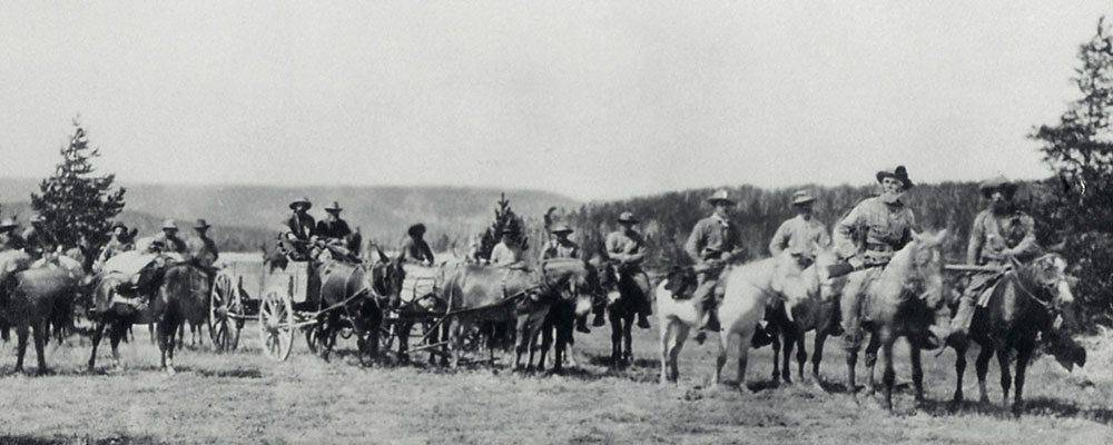 Superintendent P.W. Norris with the first wagon into the Upper Geyser Basin, 1878. NPS photo.