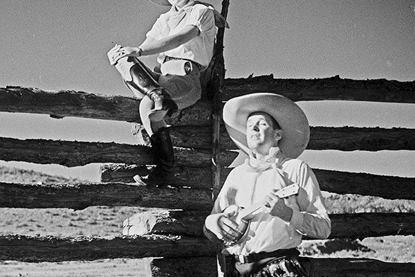 Charles Belden photo of a cowboy serenading a cowgirl, ca. 1930s. MS3 Charles Belden Collection. PN.67.799