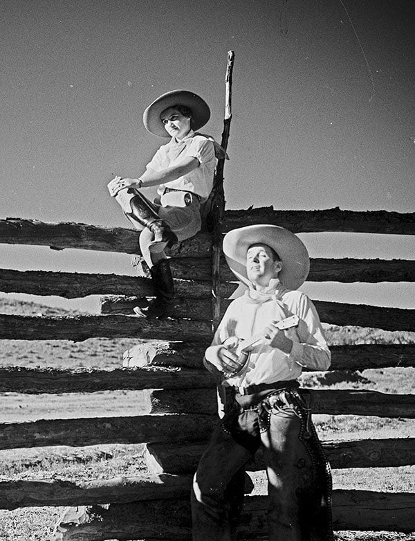 Charles Belden photo of a cowboy serenading a cowgirl, ca. 1930s. MS3 Charles Belden Collection. PN.67.799