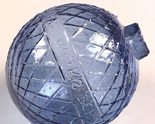 A Treasure from our West: Cross-hatch patterned blue glass target ball. 1.69.2083