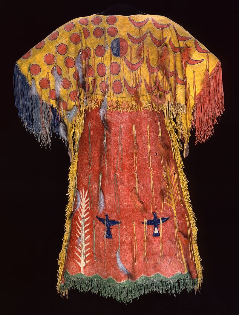 Ghost Dance dress, Southern Arapaho, c. 1890. Tanned elk hide with numerous pigments, feathers, and fringe. Chandler-Pohrt Collection. Gift of Mary J. and James R. Jundt. NA.204.4