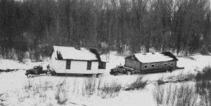 Moving houses from Elbowoods, North Dakota, across the frozen Missouri River. Image courtesy of Marilyn Cross Hudson.