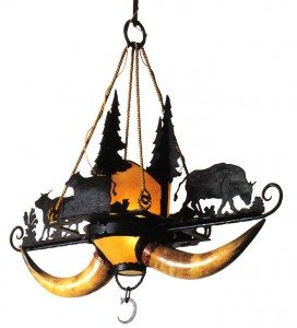 Chandelier, steer horns. Wrought iron, horn, and rawhide, this lamp incorporates silhouettes of grazing cattle and pine trees. Courtesy Robert D. Coe II