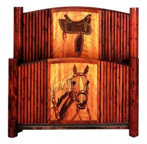 One of a set of twin beds, this hardwood-panel and pole-trim bedstead features a routed saddle design on the headboard and an intricately routed and stained horse's head on the footboard. Courtesy James E. Nielson