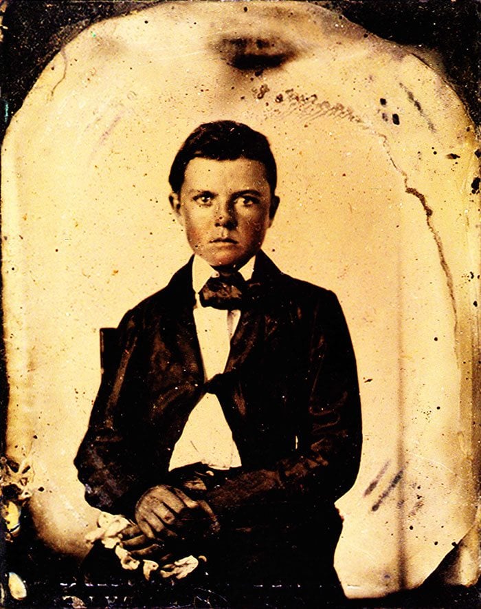 William F. Cody, age 11. This tintype is the earliest known photograph of Will Cody, taken c. 1857.* This was just before his adventures on the Great Plains began. The indented markings at the bottom of the image are illegible. MS 6 William F. Cody Collection.