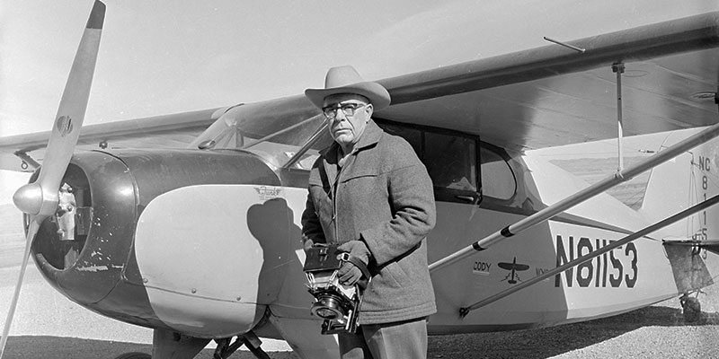 Jack Richard ready for some aerial photography, 1950s-1960s. PN.89.107.21018.04.3