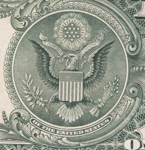 The symbol of a Bald Eagle on the US one dollar bill.