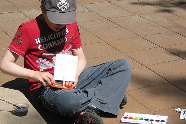 A young artist enjoys a past art workshop at the Buffalo Bill Center of the West. Colorful Creations is another such opportunity.