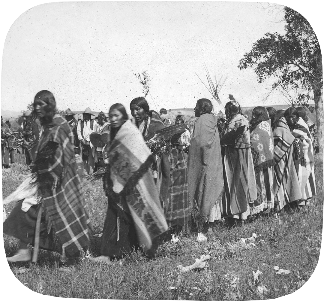 Women lined up for Tobacco Dance ceremony, in Montana, ca. 1903-1925. MS 95 Petzoldt Collection. LS.95.275