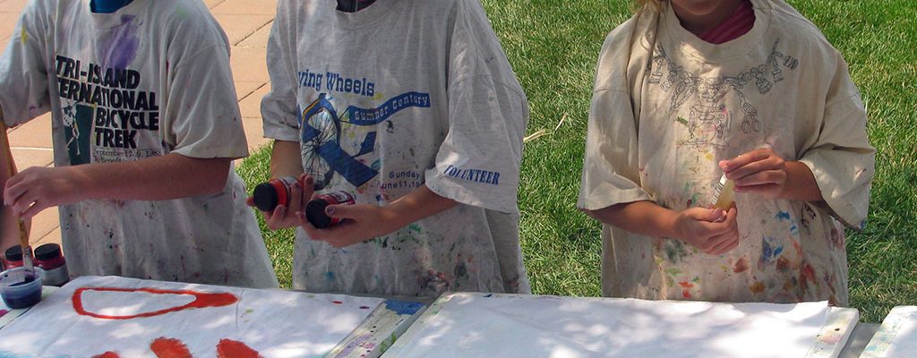 Kids enjoy a painting activity at a Buffalo Bill Center of the West Family Fun Day.