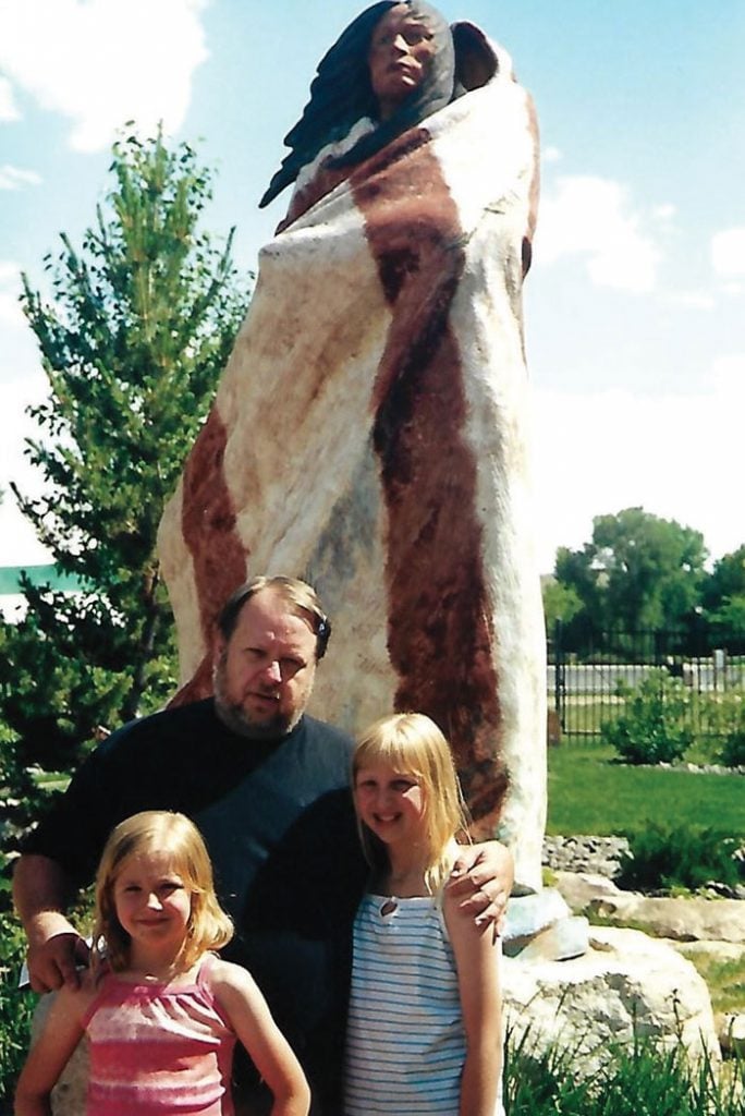 Arnold A. Brown with daughters with Harry Jackson's "Sacajawea."