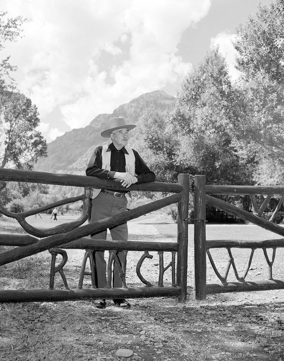 Southwest of Cody, Wyoming, Larry Larom welcomes visitors to his Valley Ranch in the early 1950s, a place where he, like other dude ranchers, "re-created the frontier without the danger," Clayton says. MS89 Jack Richard Photograph Collection, McCracken Research Library. PN.89.116.21416.1