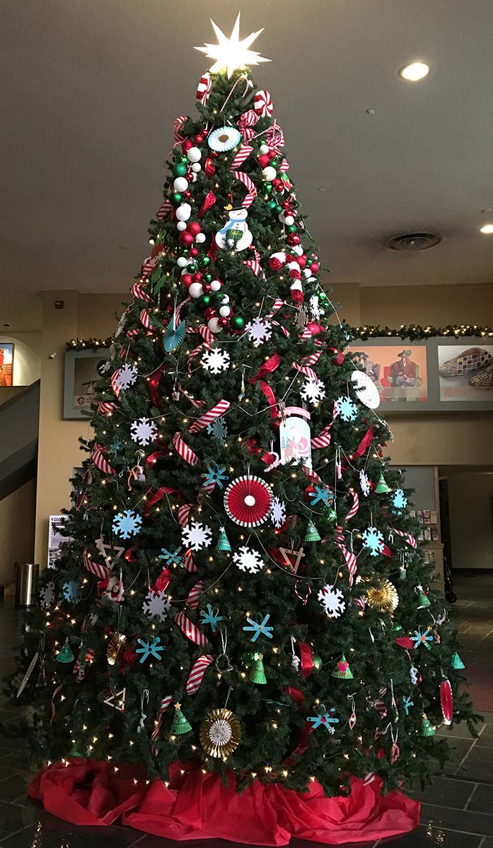 A 16-foot Christmas tree greets visitors to the Holiday Open House.