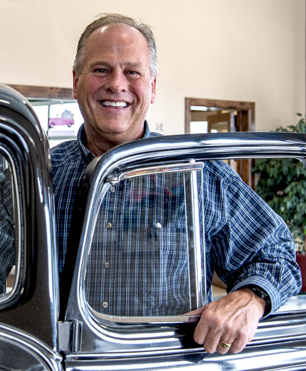 Brett Whitlock of Whitlock Motors works with the Center of the West to select a raffle car.