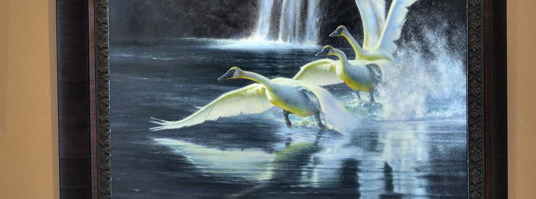M.C. Poulsen with his painting of Yellowstone's "Fairy Falls"