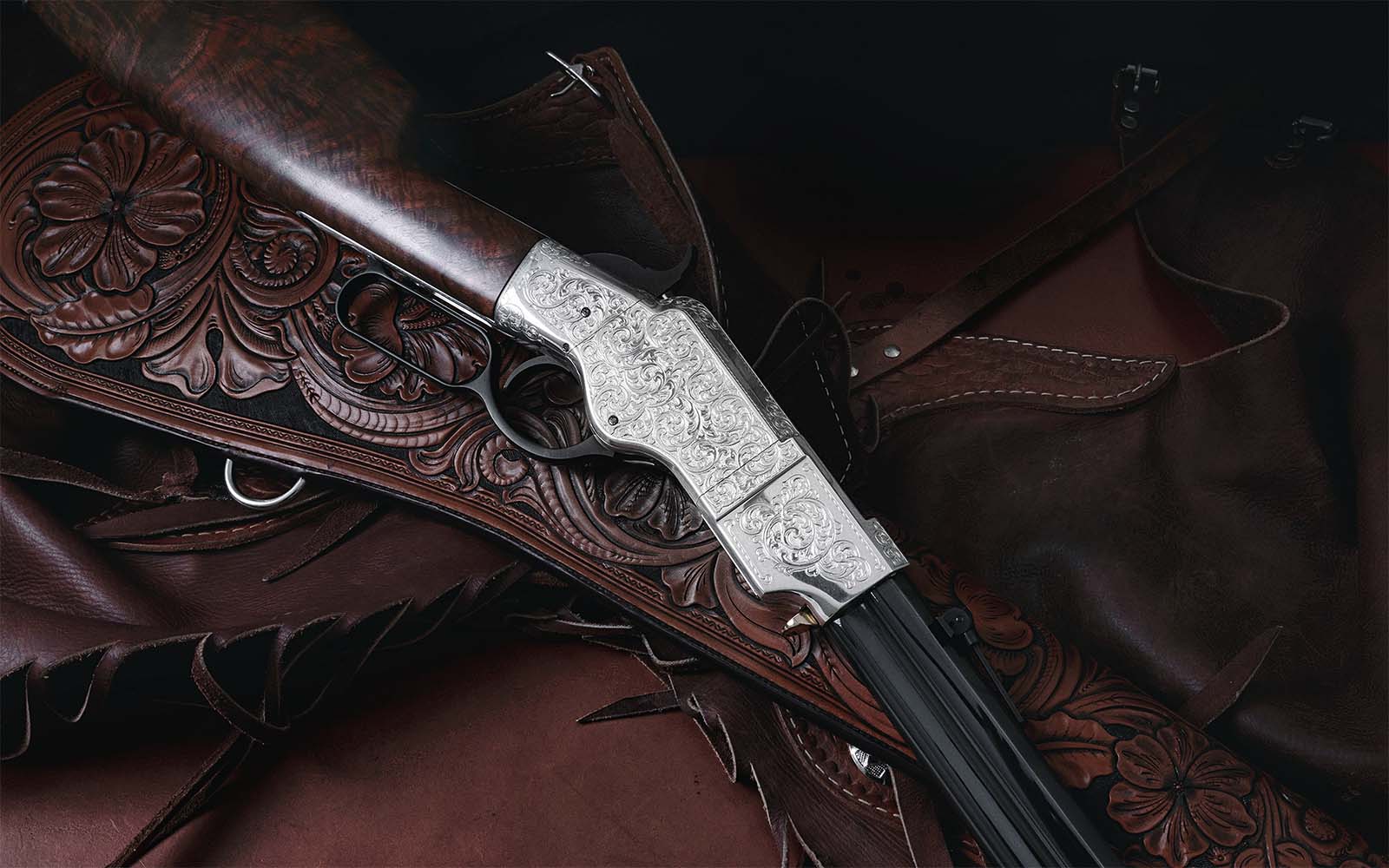 The engraving on the Henry Rifle auction item pays tribute to 19th-century engraver Louis Daniel Nimschke.