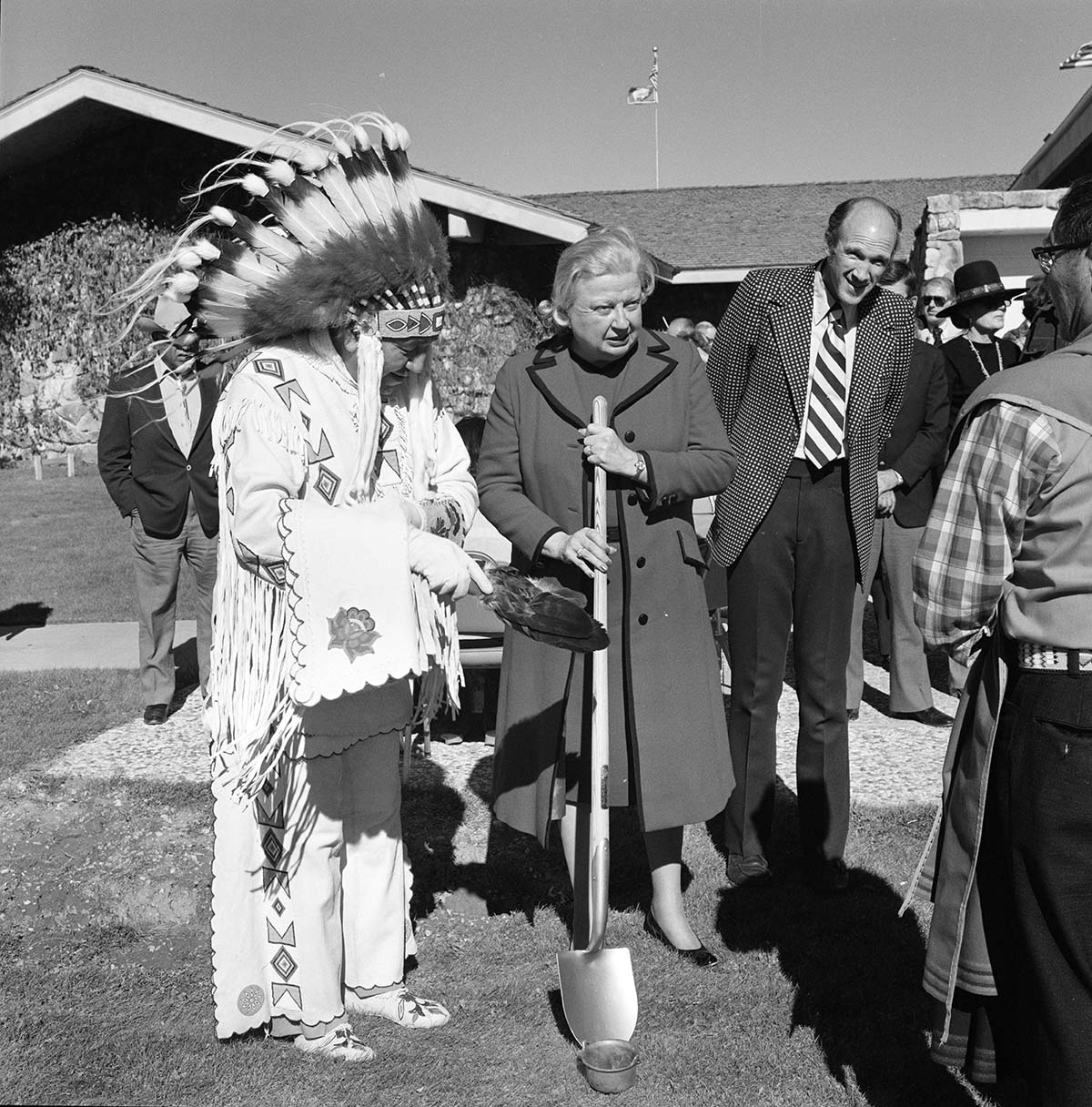 Plains Indian Museum groundbreaking, October 12, 1977, with tribal representative Peter Red Horn, Margaret "Peg" Coe, and Al Simpson. PN.89.79.13527.10