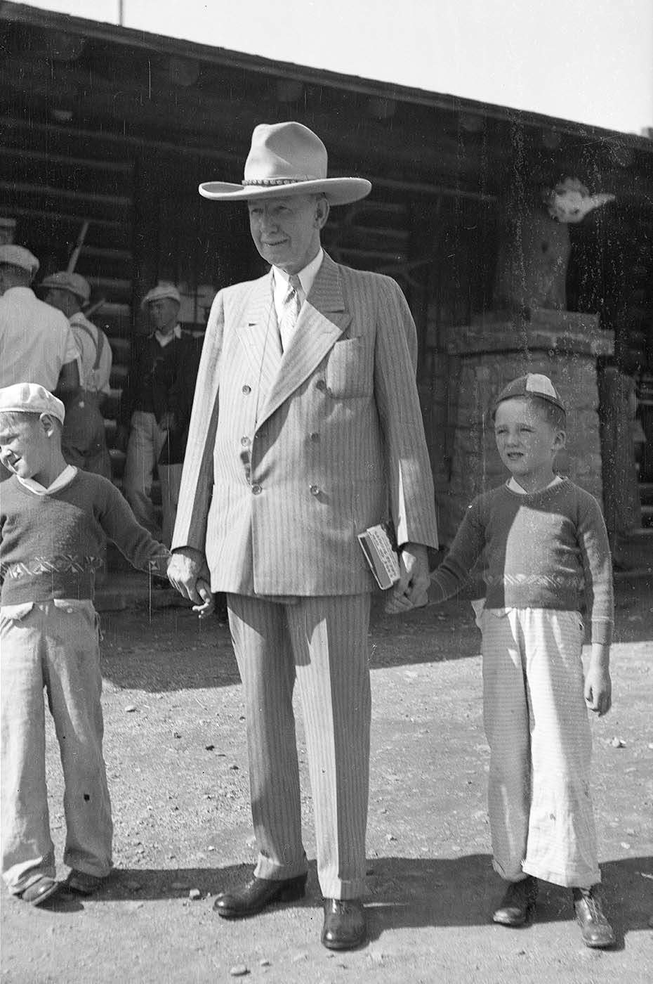 Al (left) and Pete Simpson with Charles Gates Dawe, 30th vice-president of the United States, at the Buffalo Bill Museum, ca. late 1930s. PN.89.114.21360.1