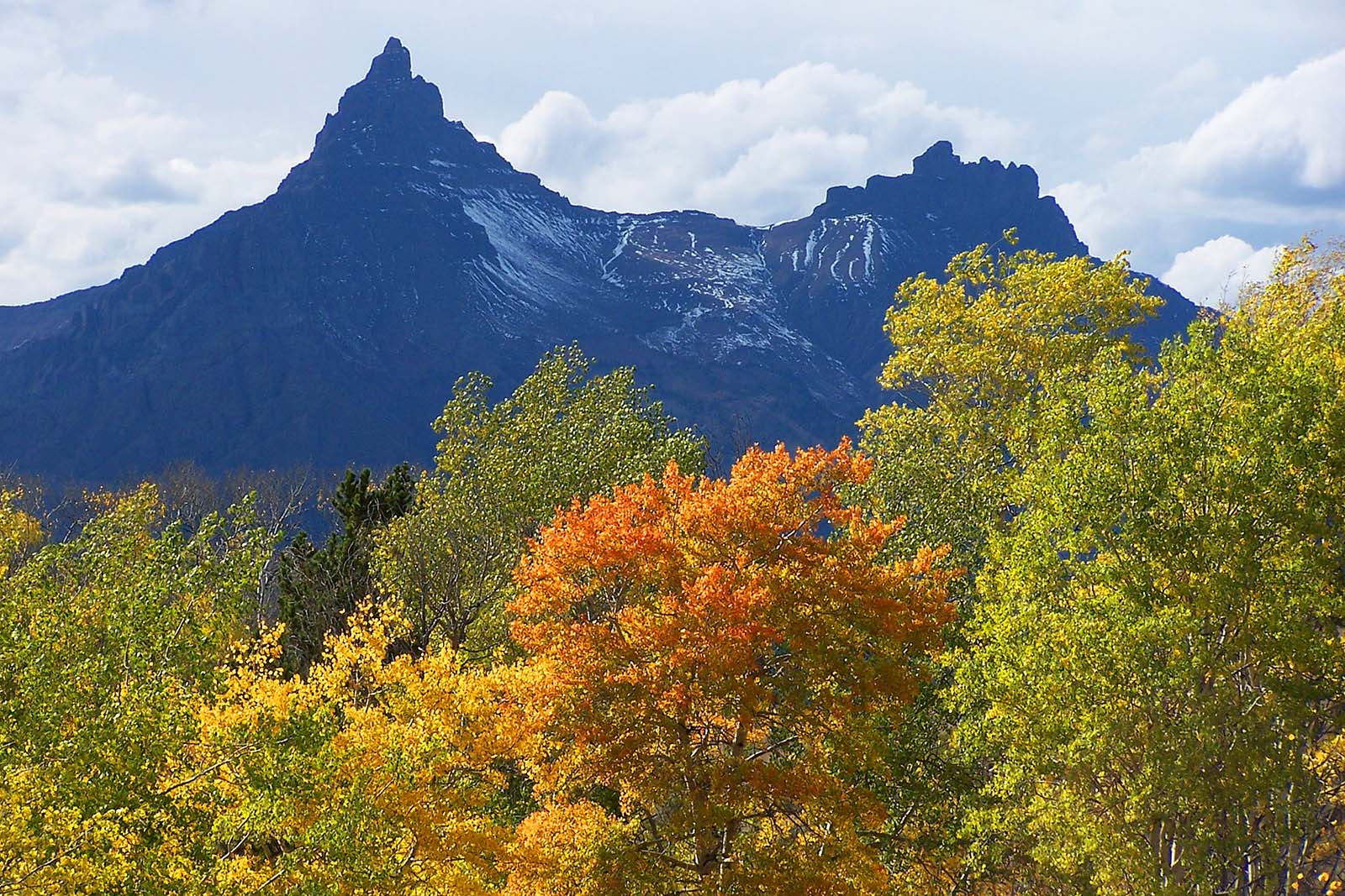 Pilot & Index Peaks with fall color. Mack Frost photograph.