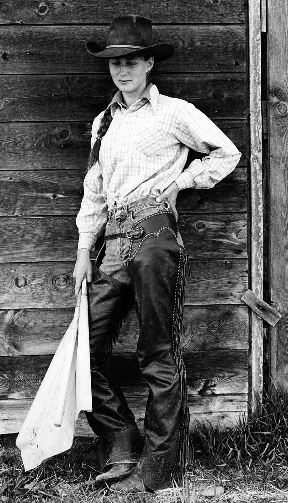 A portrait photograph by James Bama of Dede Fales. Fales still lives in the Wapiti Valley, east of Cody, Wyoming, where she co-owns and operates Rimrock Ranch, which has been run by the Fales family since 1955. MS 243 James Bama Collection, McCracken Research Library. P.243.47539