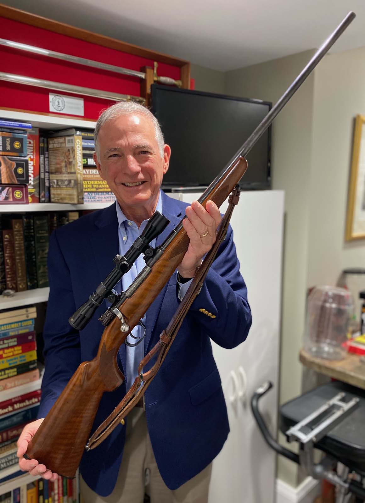 Author Steve Sanetti displays a German 98k Mauser rifle that once belonged to his father.